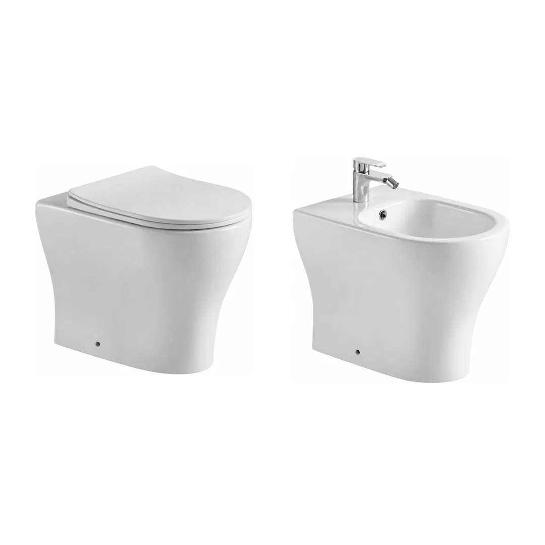 Karag Coppia sanitari filo muro New Paros bianco lucido Rimless con vaso WC, bidet e coprivaso